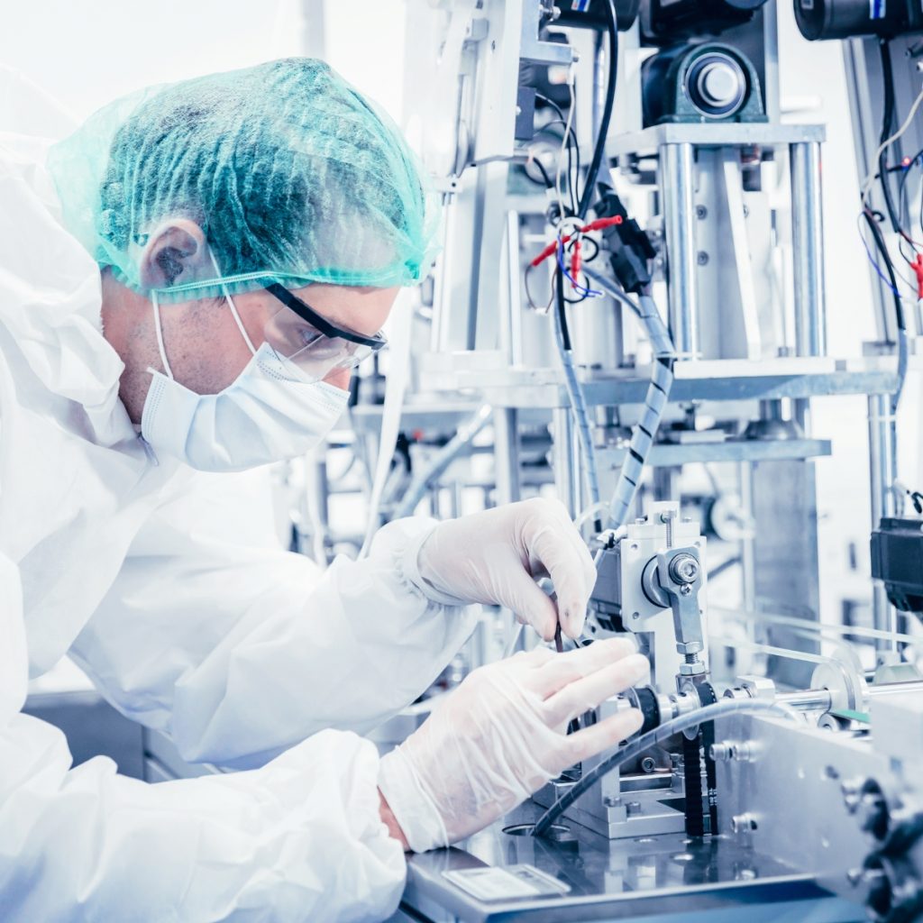 lab tech calibrating equipment