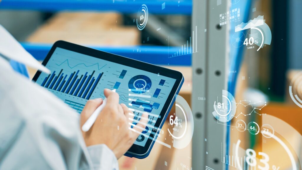 worker using a tablet for an audit in a warehouse