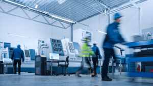 Indusry,4.0,Factory:,Blurred,Motion,Shot,Of,A,Team,Of