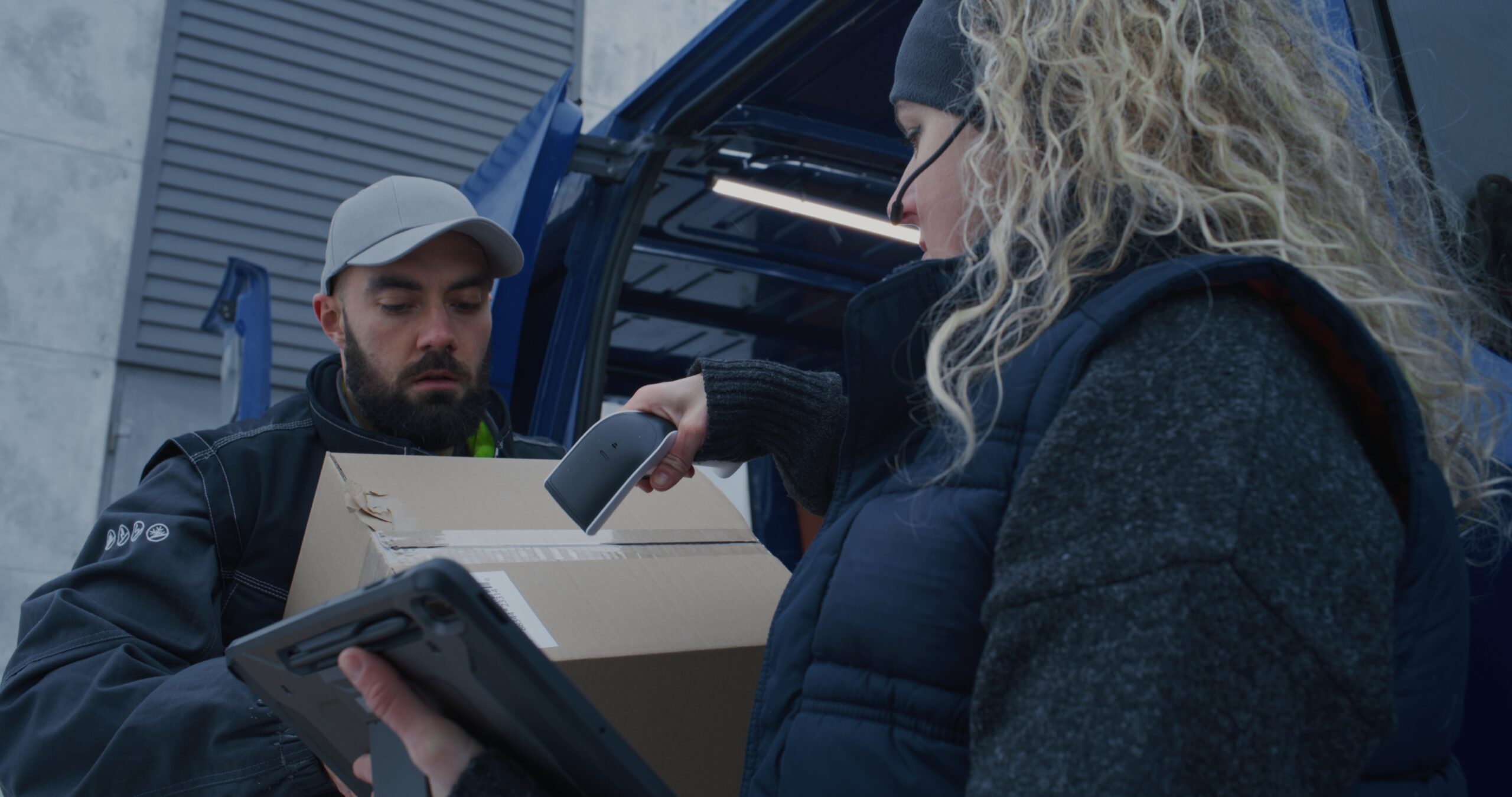 Logistics,Team,Unloads,Parcels,From,Delivery,Van,During,Snowfall.,Man