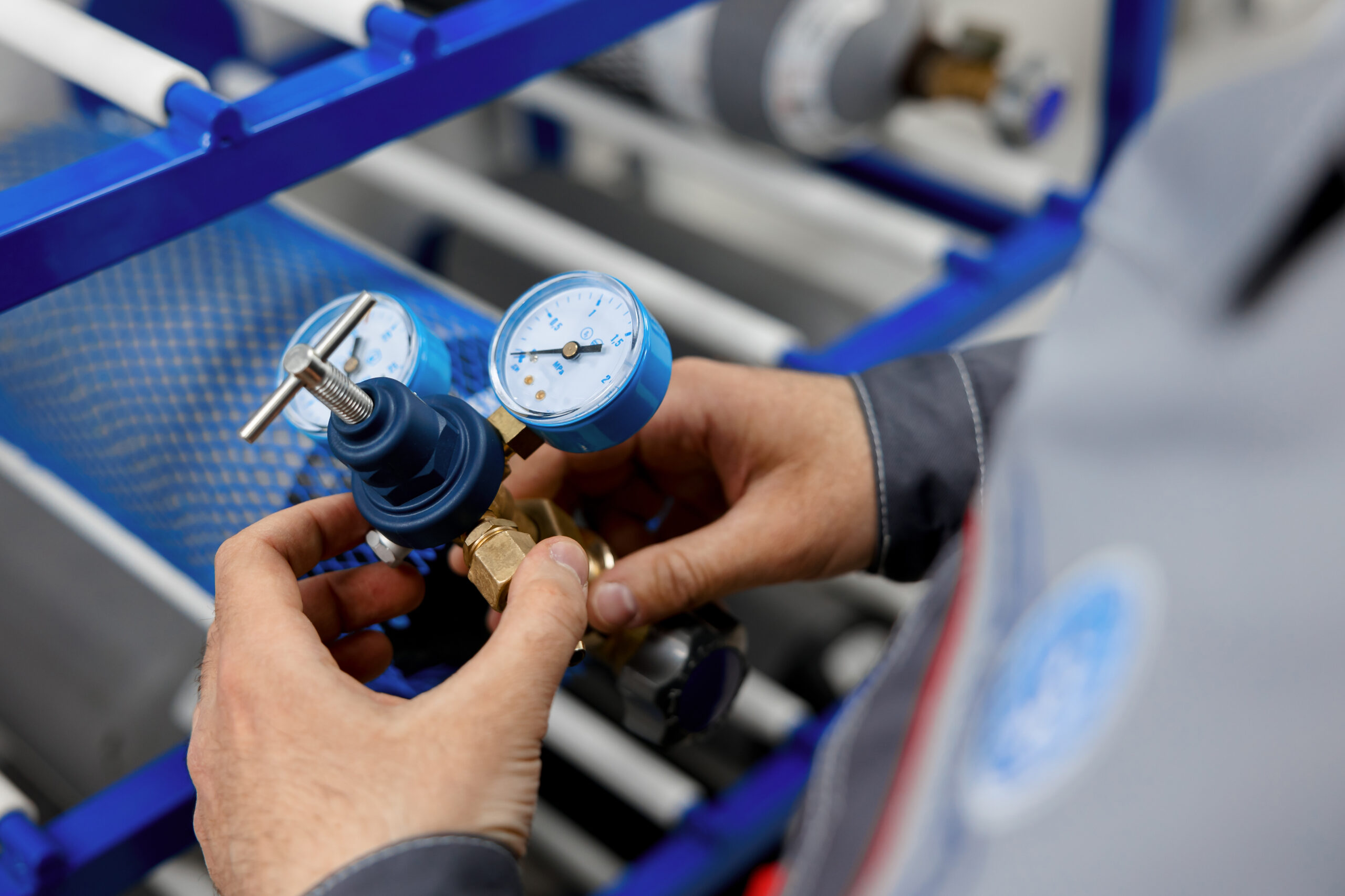 A,Metrology,Laboratory,Specialist,Takes,A,Compressed,Gas,Cylinder,For