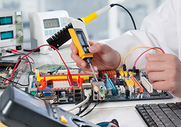 Repairman fixes electronic equipment Repairman fixes electronic equipment in service center