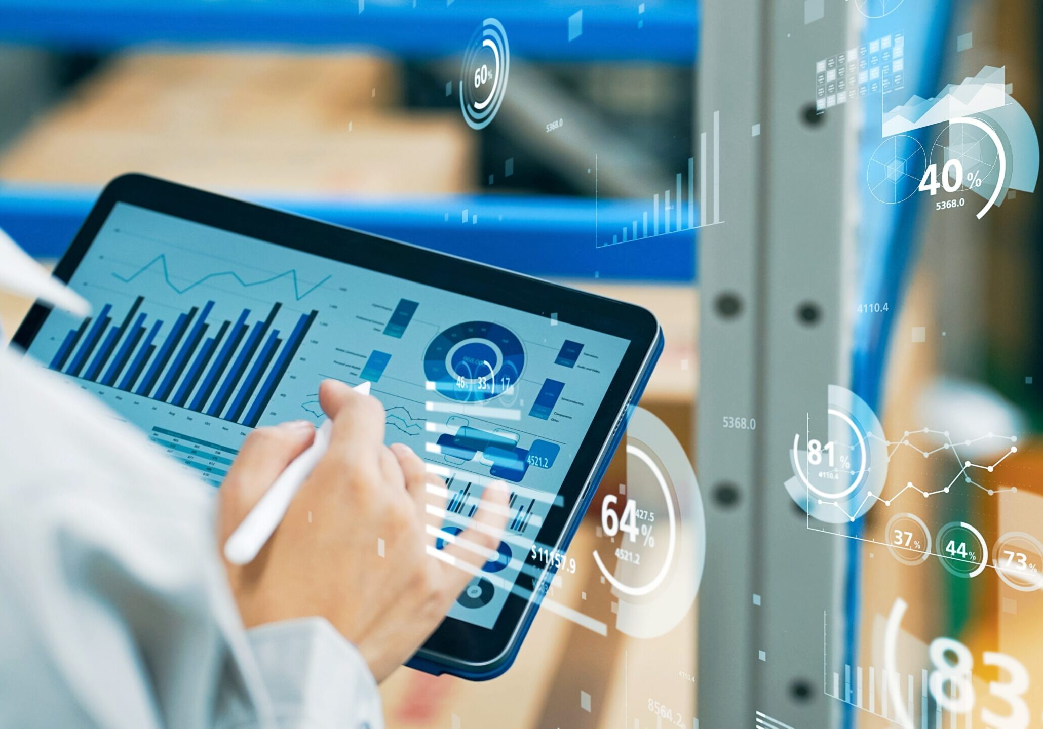 worker using a tablet for an audit in a warehouse