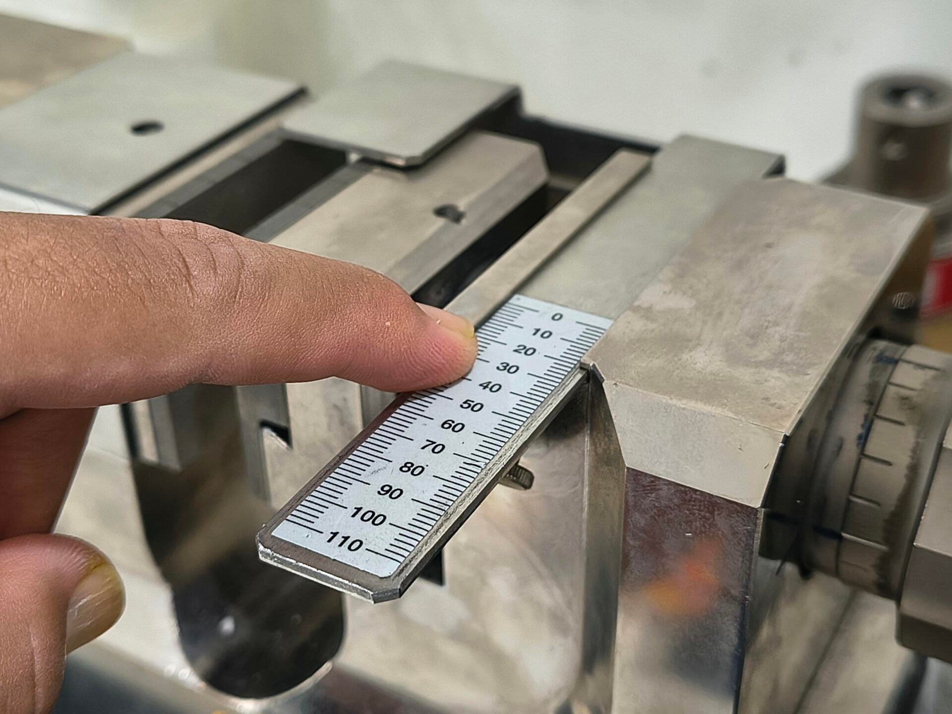 Close up Of A Finger Pointing At Measuring Scale